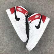 Top-down view of the pair displaying the white uppers, red overlays, and black side logos.