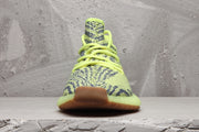 Front view showing the woven patterned upper, matching laces, and rounded toe.