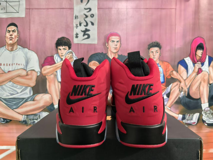 Rear view of red and black Jordan high-top sneakers showing Nike Air branding