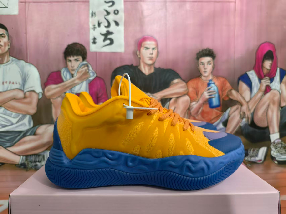 Side view of yellow and blue basketball sneakers with orange-toned laces and a sculpted blue sole