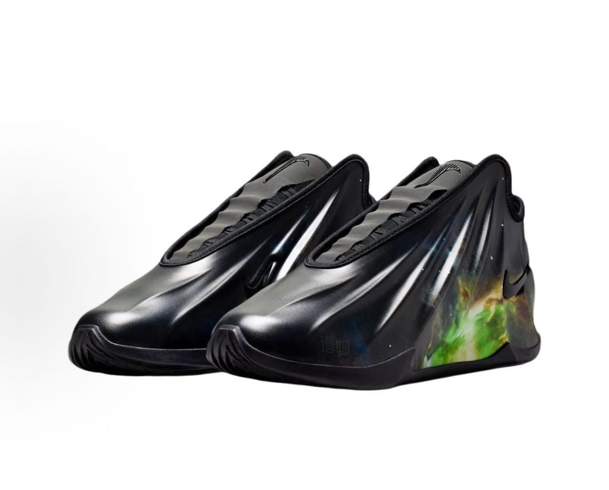 Pair of black high-top sneakers with green graphic heel detailing and visible Nike swooshes.