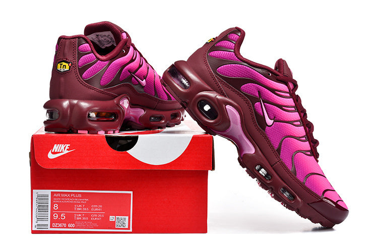 Pink and burgundy Nike Air Max Plus sneakers displayed with a box labeled DZ3670-600 and size markings