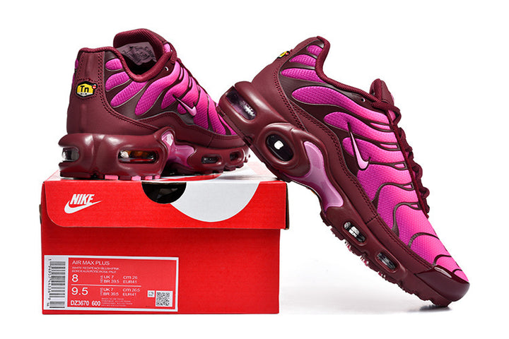 Pink and burgundy Nike Air Max Plus sneakers displayed with a box labeled DZ3670-600 and size markings