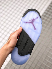 Bottom view showing the translucent outsole, herringbone-style tread, and Jordan branding.
