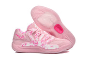 Pink Nike KD shoes shown with the wavy outsole tread visible.