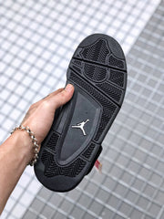 Underside view showing the black rubber outsole with textured traction patterns and Jordan logo.