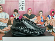 Black Nike basketball shoe shown in side profile with sculpted side panels