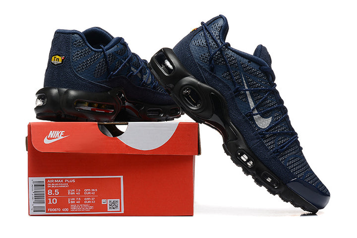 Navy and black Nike Air Max Plus sneakers displayed with a shoe box showing style code FD0670-400 and sample size information.