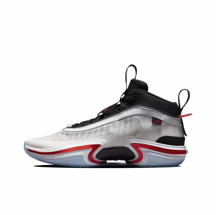 Side view of a black, white and red Jordan Air Jordan 36 basketball sneaker.