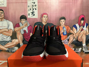 Front view showing the black lace-up uppers and visible Hyperdunk tongue text.
