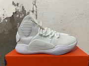 Side view of a white Nike high-top basketball shoe with a gray Swoosh and Zoom-marked midsole.