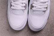 Close-up of the white toe boxes and mesh sections on both sneakers.