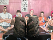 Rear view showing “TWELVE” heel lettering on the brown shoes