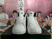 Front view of the pair showing white laces, padded tongues, and black trim.