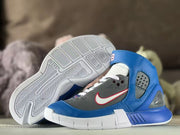 Sneaker outsole close-up showing molded tread patterns and a textured white sole.