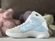 Side profile showing the white Swoosh and pale blue panels on a Nike HD2008 kids high-top sneaker.
