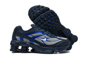 Nike Shox Ride 2 sneaker pair showing the side profile and patterned outsole.