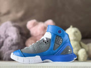 Lateral view highlighting the blue upper, gray perforated panels, and white outsole.