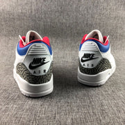 Rear view showing the Nike Air branding, white heel panels and elephant-print heel overlays.
