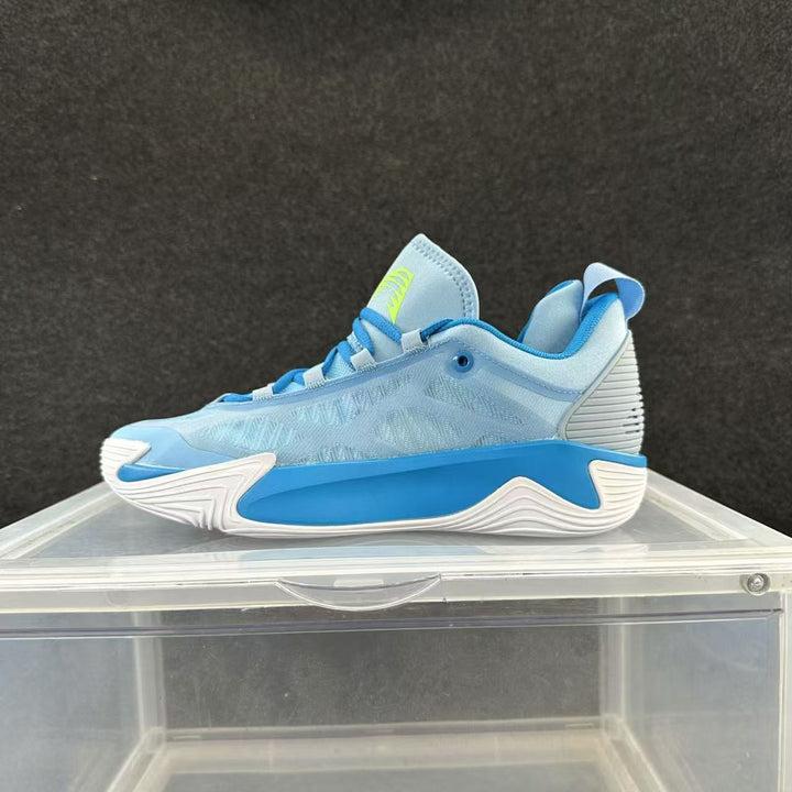 Blue Nike low-top basketball shoe with a bright blue sculpted sole