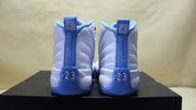 Rear view showing the blue heel tabs and raised 23 details.