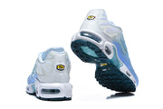 Rear and outsole views of light blue and white Nike Air Max Plus sneakers.
