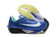 Side and outsole views of blue Nike Zoom Fly 6 shoes with pale yellow tread and teal details.