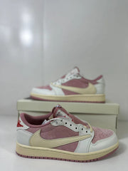 Close side view highlighting the pink side panel, cream Swoosh, white overlays, and low-top profile.