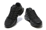 Front views of a pair of black Nike Air Max Plus TN-style sneakers.