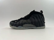 Black high-top sneaker with repeated tonal swoosh graphics and a translucent outsole.
