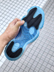 Bottom view showing the translucent blue outsole and black traction pattern.