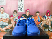 Front view of blue Nike Kobe basketball shoes showing perforated toe panels.