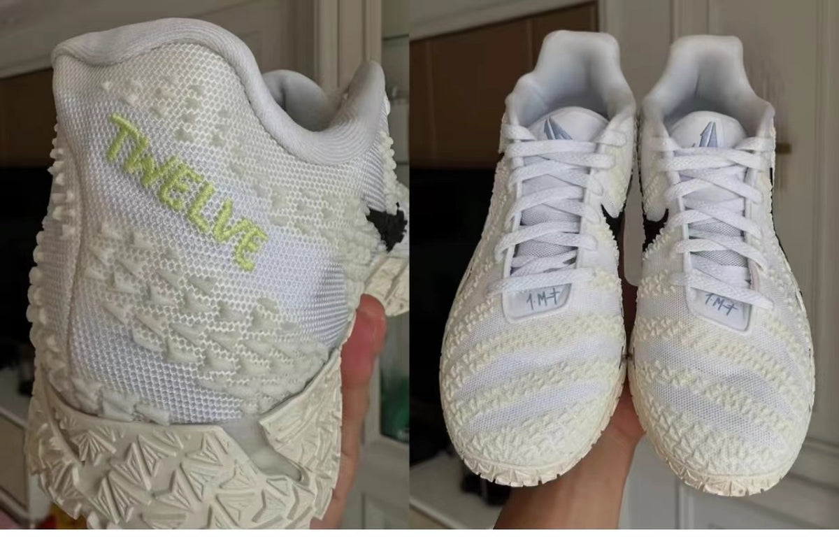 Pair of white textured sneakers shown from a side angle and from the front, with green side lettering, tonal laces and patterned outsoles.