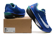 Blue Nike Zoom Fly 6 shoe with teal, black, and yellow details beside a labeled shoe box.