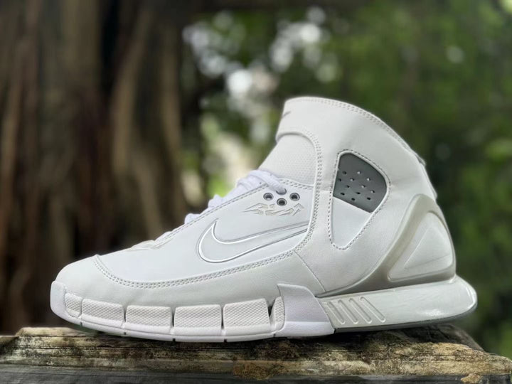Side view of a white Nike Zoom Huarache 2K5 high-top sneaker