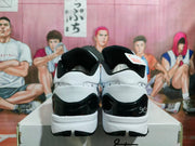 Rear view of the matching black-and-white basketball shoes with glossy black heel sections.