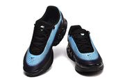 Front views of black and blue sneakers with light blue gradient detailing