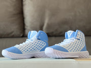 Two light blue and white high-top basketball shoes shown together with Kobe branding on the tongues.