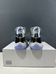 Rear view of the pair showing silver heel panels, blue logos, and translucent blue outsole sections.