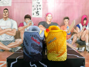 Rear view of the blue and yellow shoes with LeBron branding visible on the blue heel.