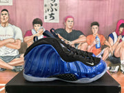 Side view of a blue molded-shell high-top sneaker with black laces and a white Swoosh