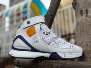 Angled side view highlighting the shoe's ankle strap, map-patterned upper, and orange perforated panel