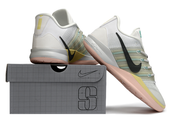 White and green Nike Sabrina 3 shoes displayed with a shoe box
