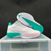 Side and outsole views showing the turquoise-and-white patterned sole.