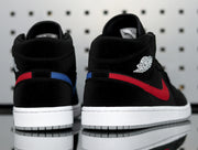 Rear view showing the black padded collars, white Jordan wing branding and red-and-blue heel accents.