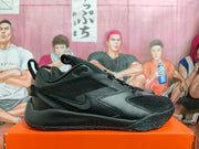 Side profile of a black Nike Zoom basketball shoe with Swoosh branding.