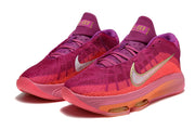 Pink and purple Nike GT Hustle 3 pair with bright coral panels and contrasting Swoosh details.