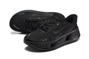 Pair of black Nike Comfort Ride EasyOn sneakers shown at an angle.