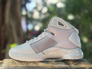 Opposite side view showing the gray upper, off-white overlays, lace-up closure, and sculpted sole.