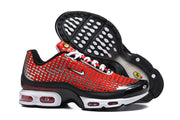 Nike Air Max Plus sneakers shown from the side and outsole, highlighting the red, black, and white design